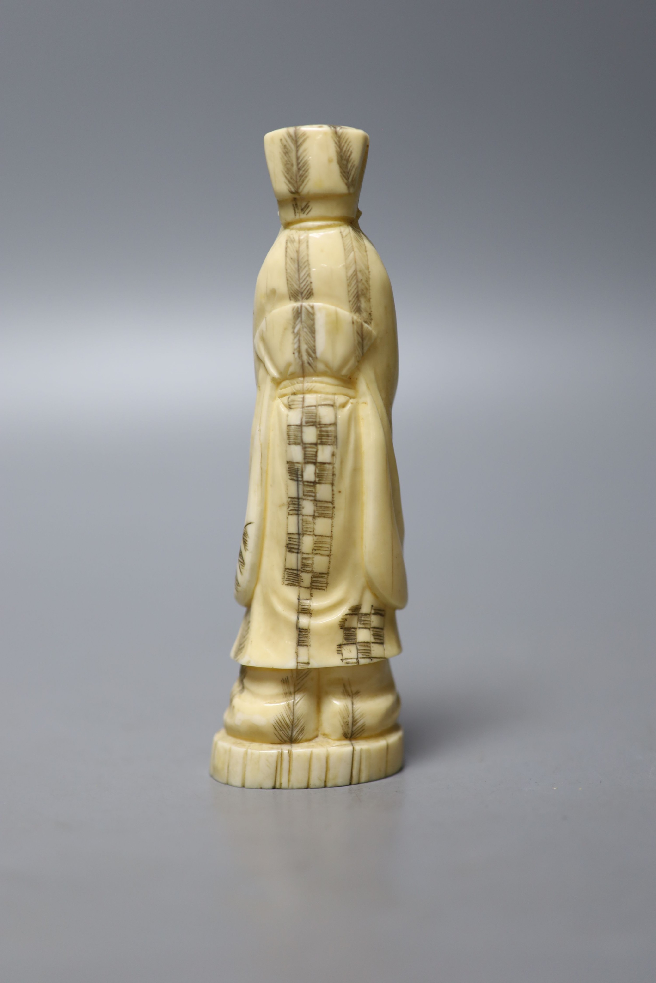 A Japanese walrus ivory figure of an immortal, early 20th century, 13cm